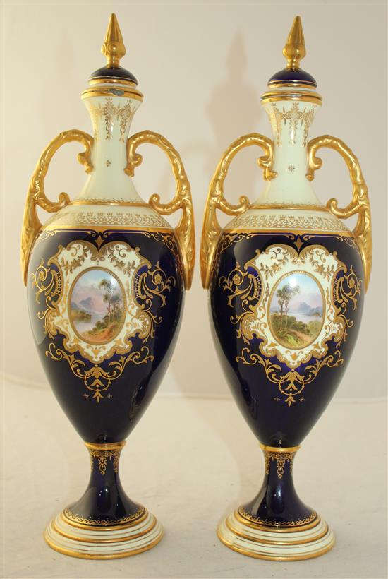 A pair of large Coalport oviform pedestal vases and covers, c.1902, 36cm